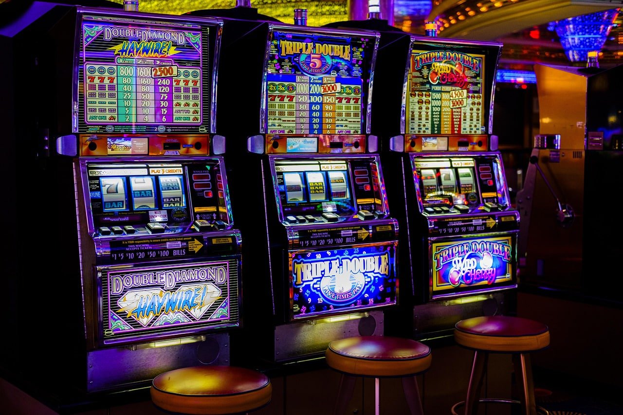 atom slot mobile app interface showing live blackjack table and account dashboard on smartphone screen